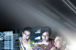 IT campaign motive - IT key visual. Three people behind screens showing